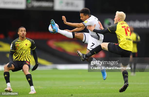 Korey Smith of Swansea City controls the ball whilst under pressure from Will Hughes of Watford during the Sky Bet Championship match between Watford...