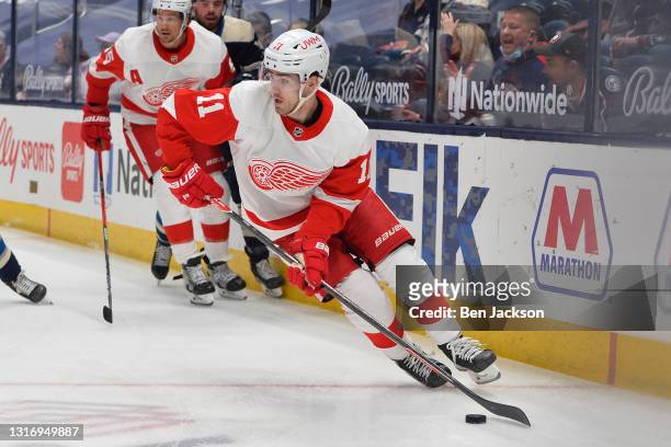 Filip Zadina of the Detroit Red Wings skates with the puck during the first period of a game against the Columbus Blue Jackets at Nationwide Arena on...