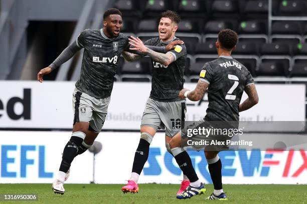 Cheyenne Dunkley of Sheffield Wednesday celebrates with Josh Windass and Liam Palmer after scoring their side's third goal during the Sky Bet...