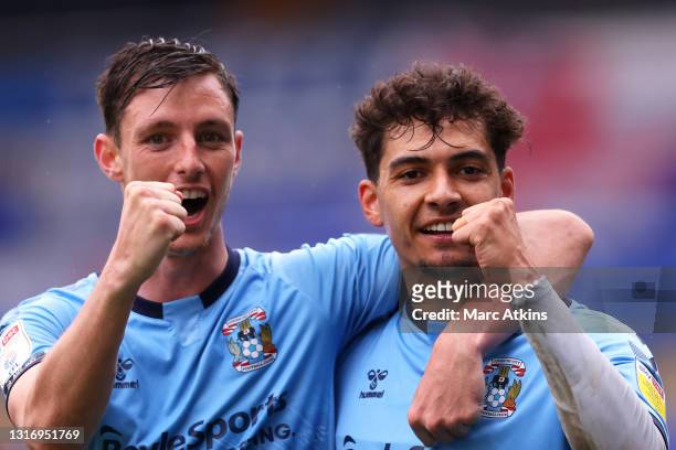 Tyler Walker of Coventry City celebrates after scoring their team's sixth goal with Matthew James during the Sky Bet Championship match between...