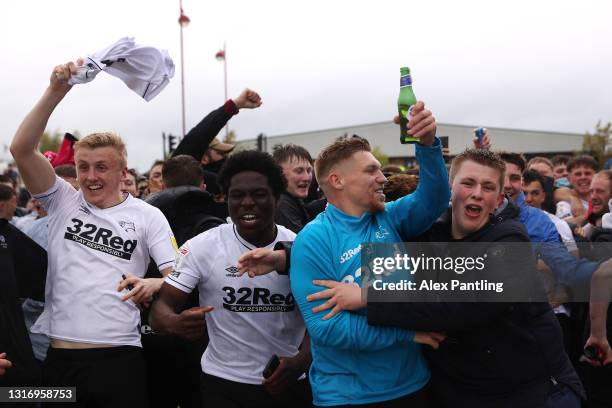 Martyn Waghorn of Derby County celebrates with fans outside the stadium after the Sky Bet Championship match between Derby County and Sheffield...