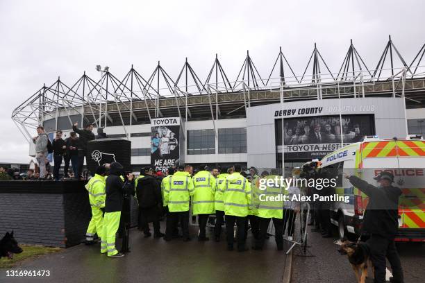 Police line up as growds gather outside the stadium after the Sky Bet Championship match between Derby County and Sheffield Wednesday at Pride Park...