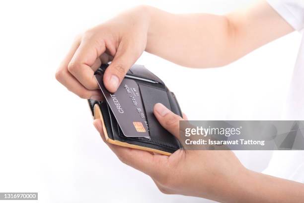 woman hand take out showing blank card for payment from pink wallet. credit debit card with chip - businessman hands in pockets stock pictures, royalty-free photos & images