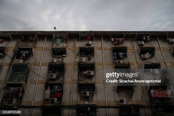 Exterior of a densely occupied apartment in Khlong Toei slum on May 08, 2021 in Bangkok, Thailand. Thailand is currently facing the third wave of the...