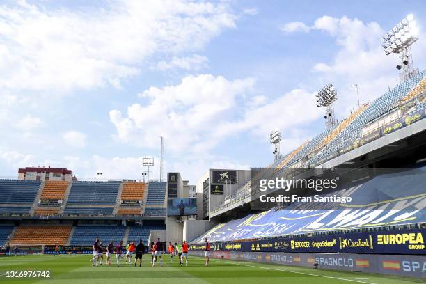 General view inside the stadium as the SD Huesca squad warm up during the La Liga Santander match between Cadiz CF and SD Huesca at Estadio Ramon de...