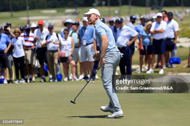 John Murphy of Team Great Britain and Ireland celebrates on the 18th green during Day One of The Walker Cup at Seminole Golf Club on May 08, 2021 in...