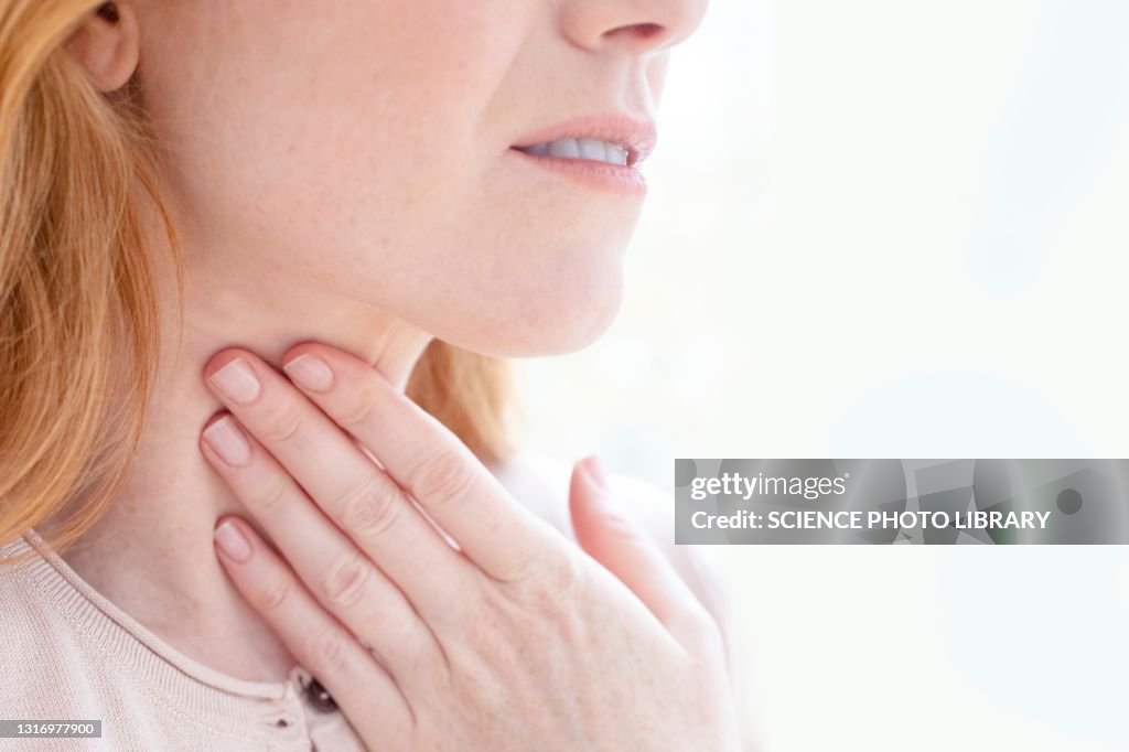 Woman with sore throat