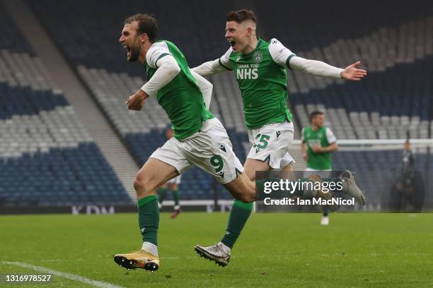 Christian Doidge of Hibernian celebrates after scoring their side's second goal during the William Hill Scottish Cup match between Dundee United and...