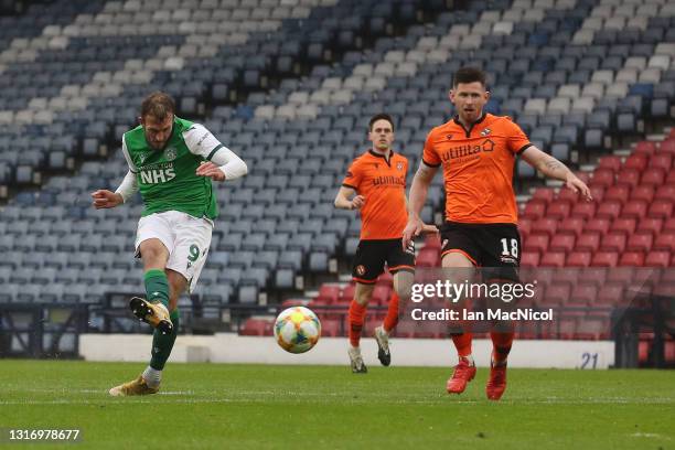 Christian Doidge of Hibernian scores their team's second goal during the William Hill Scottish Cup match between Dundee United and Hibernian at...