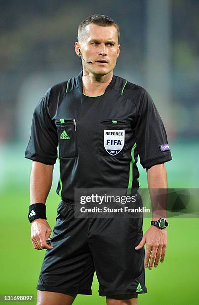 Referee Vladislav Bezborodov in action during the UEFA Champions League group F match between Borussia Dortmund and Olympiacos FC at Signal Iduna...