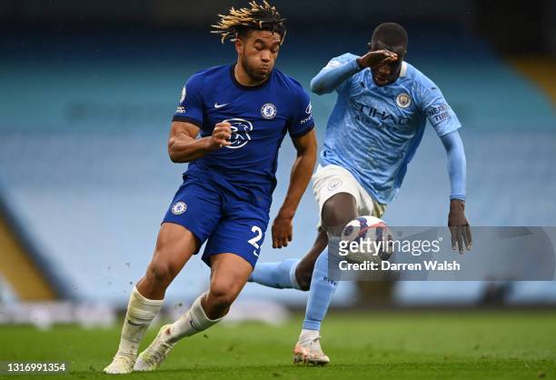 Reece James of Chelsea gets away from Benjamin Mendy of Manchester City during the Premier League match between Manchester City and Chelsea at Etihad...
