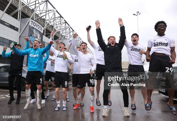 Derby County celebrate with fans outside the stadium as they secure safety in the Championship the Sky Bet Championship match between Derby County...