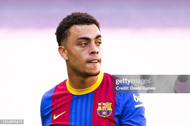 Sergiño Dest of FC Barcelona looks on during the La Liga Santander match between FC Barcelona and Atletico de Madrid at Camp Nou on May 08, 2021 in...