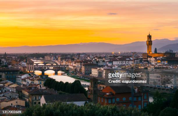 view of florence at sunset from piazzale michelangelo, florence cityscape, italy - palazzo vecchio stock pictures, royalty-free photos & images