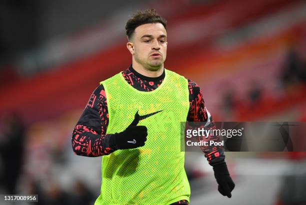 Xherdan Shaqiri of Liverpool warms up during the Premier League match between Liverpool and Southampton at Anfield on May 08, 2021 in Liverpool,...