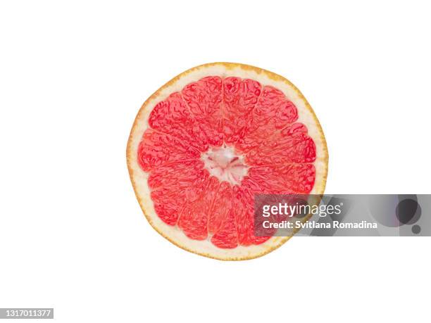 slice of grapefruit isolated on white background - grapefruit stock pictures, royalty-free photos & images