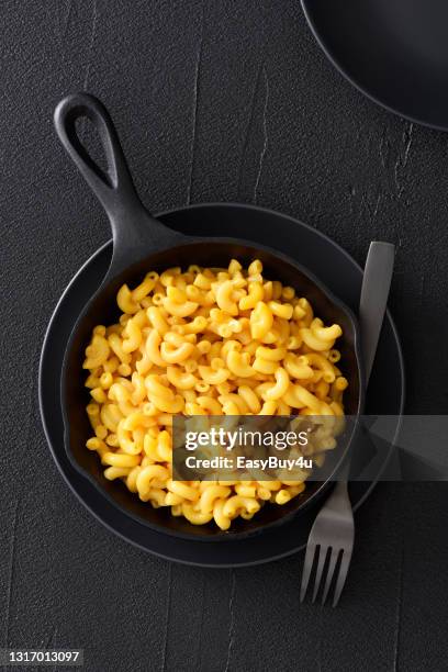 macaroni and cheese - iron bowl stock pictures, royalty-free photos & images