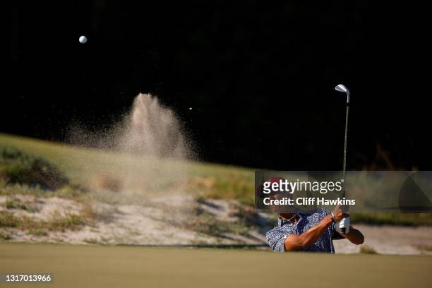 Ricky Castillo of Team USA plays his shot from the bunker on the 14th hole during Saturday singles matches of Day One of The Walker Cup at Seminole...