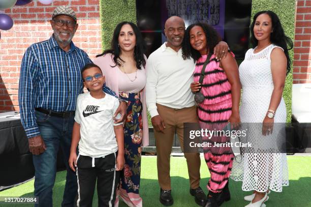 Mike Tyson poses with his father-in-law, Shamsud din Ali, son Morocco, mother-in-law Rita Ali, wife Lakiha "Kiki" Spicer and daughter Milan Tyson...