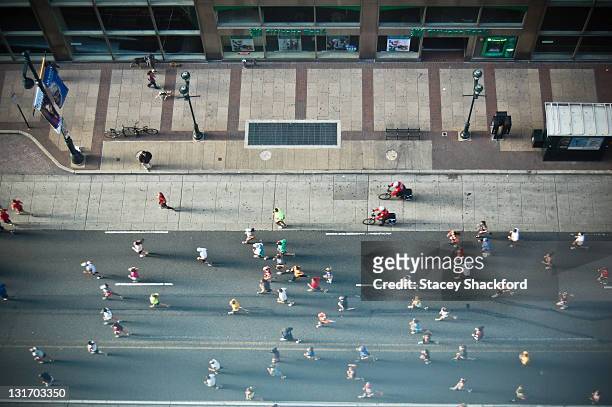 marathon on street - marathon stock-fotos und bilder