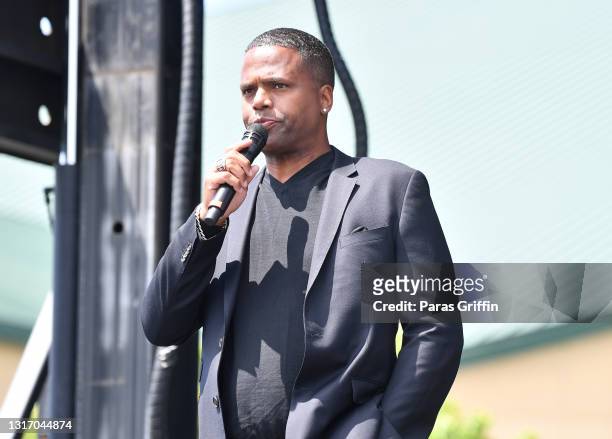 Journalist A. J. Calloway speaks onstage during Ahmaud Arbery Foundation Kick Off & Drive Up Birthday Bash at New Birth Missionary Baptist Church on...