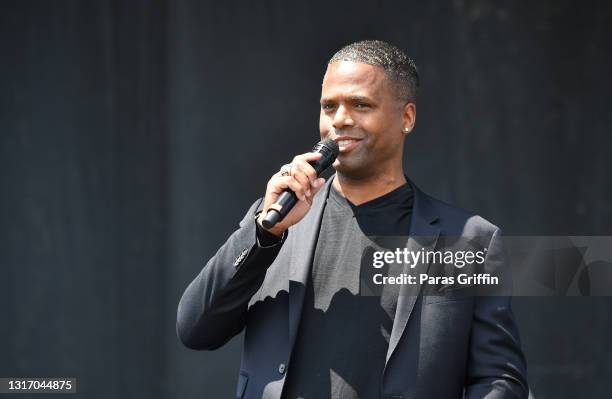 Journalist A. J. Calloway speaks onstage during Ahmaud Arbery Foundation Kick Off & Drive Up Birthday Bash at New Birth Missionary Baptist Church on...