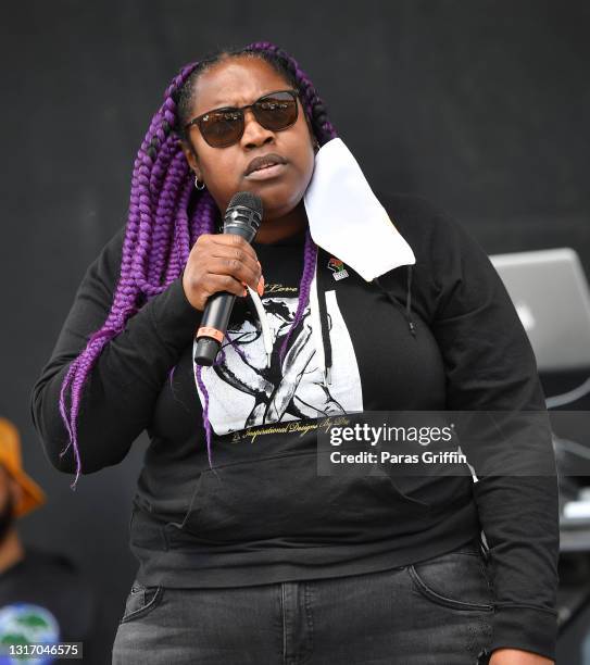 Kimberly Latrice Jones speaks onstage during Ahmaud Arbery Foundation Kick Off & Drive Up Birthday Bash at New Birth Missionary Baptist Church on May...