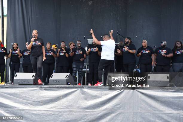 Chase Williams and Sha Bach Choice perform onstage during Ahmaud Arbery Foundation Kick Off & Drive Up Birthday Bash at New Birth Missionary Baptist...