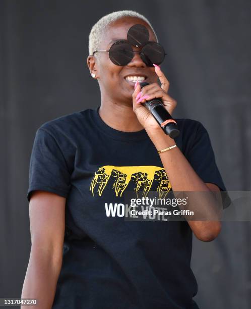 Tiffany Loftin speaks onstage during Ahmaud Arbery Foundation Kick Off & Drive Up Birthday Bash at New Birth Missionary Baptist Church on May 08,...