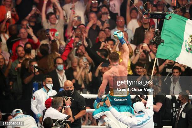 Saul Canelo Alvarez celebrates his win against Billy Joe Saunders during WBC, WBA Super, WBO and Ring Magazine World Super-Middleweight...