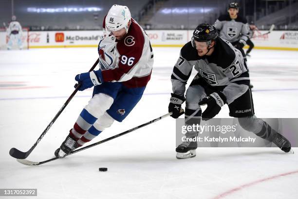 Mikko Rantanen of the Colorado Avalanche skates for the puck against Austin Wagner of the Los Angeles Kings during the third period at Staples Center...