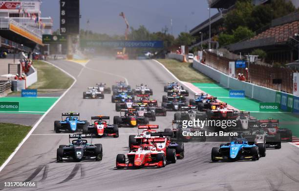 Dennis Hauger of Norway and Prema Racing leads the field into turn one at the start during race 3 of Round 1:Barcelona of the Formula 3 Championship...