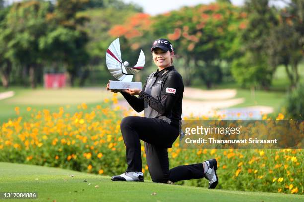 Ariya Jutanugarn of Thailand poses with the trophy on the 8th green after winning the Honda LPGA Thailand at the Siam Country Club Pattaya Old Course...