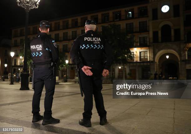 Two local police officers on a street in Toledo, during the first night without the state of alarm, on May 8 in Toledo, Castilla-La Mancha, Spain....