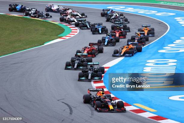 Max Verstappen of the Netherlands driving the Red Bull Racing RB16B Honda leads the field during the F1 Grand Prix of Spain at Circuit de...