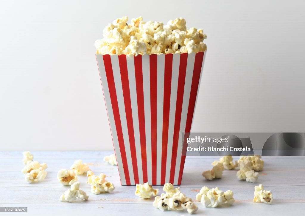 Paper striped bucket with popcorn
