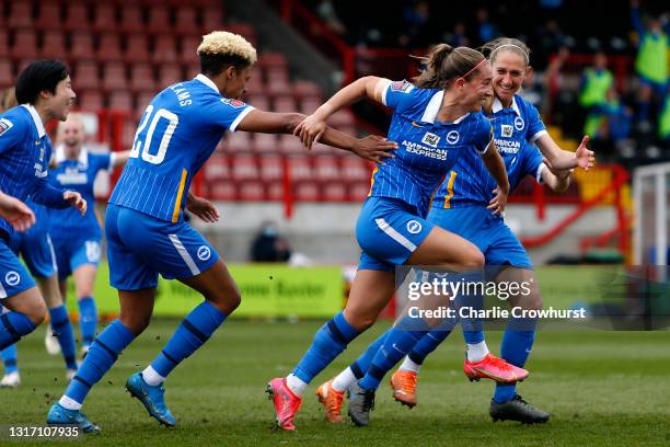 Brighton's Maya Le Tissier celebrates with team mates Victoria Williams and Aileen Whelan after scoring the teams first goal during the Barclays FA...