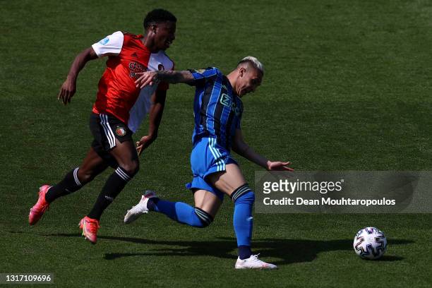 Antony of Ajax is tackled and fouled by Tyrell Malacia of Feyenoord Rotterdam during the Dutch Eredivisie match between Feyenoord and Ajax Amsterdam...
