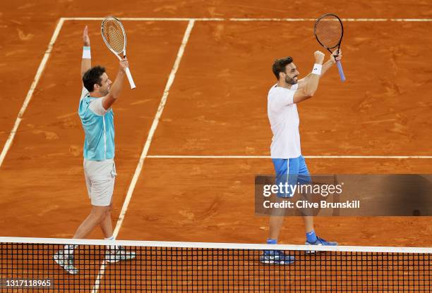 Marcel Granollers of Spain and Horacio Zeballos of Argentina celebrate after winning their Mens Doubles Final match against Nikola Mektic of Croatia...