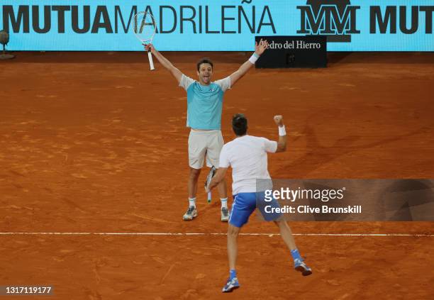 Marcel Granollers of Spain and Horacio Zeballos of Argentina celebrate after winning their Mens Doubles Final match against Nikola Mektic of Croatia...