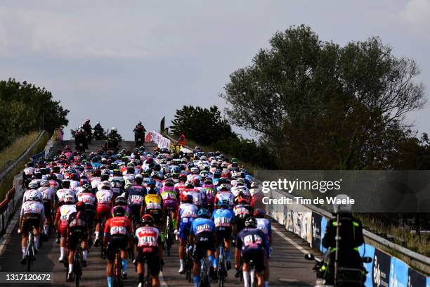 The peloton passing through landscape during the 104th Giro d'Italia 2021, Stage 2 a 179km stage from Stupinigi to Novara / @girodiitalia / #Giro /...