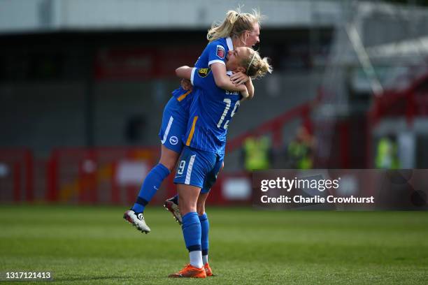 Inessa Kaagman of Brighton celebrates with team mate Emily Simpkins after scoring the teams third goal from a free kick during the Barclays FA...