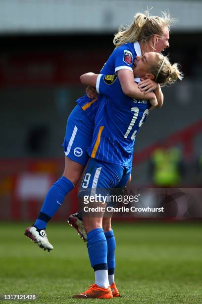 Inessa Kaagman of Brighton celebrates with team mate Emily Simpkins after scoring the teams third goal from a free kick during the Barclays FA...