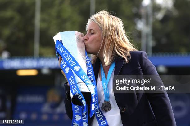 Emma Hayes, Manager of Chelsea celebrates with the Barclays FA Women's Super League Trophy after the Barclays FA Women's Super League match between...
