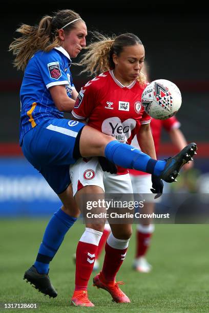 Ebony Salmon of Bristol City looks to hold off Brighton's Aileen Whelan during the Barclays FA Women's Super League match between Brighton & Hove...