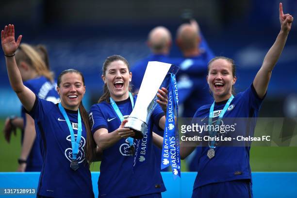 Fran Kirby, Maren Mjelde and Guro Reiten of Chelsea celebrate with the Barclays FA Women's Super League Trophy after the Barclays FA Women's Super...