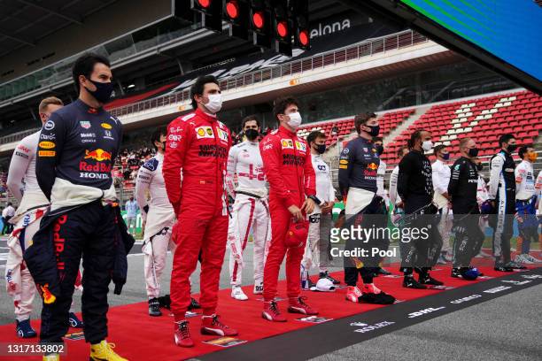 The F1 drivers stand on the grid prior to the F1 Grand Prix of Spain at Circuit de Barcelona-Catalunya on May 09, 2021 in Barcelona, Spain.