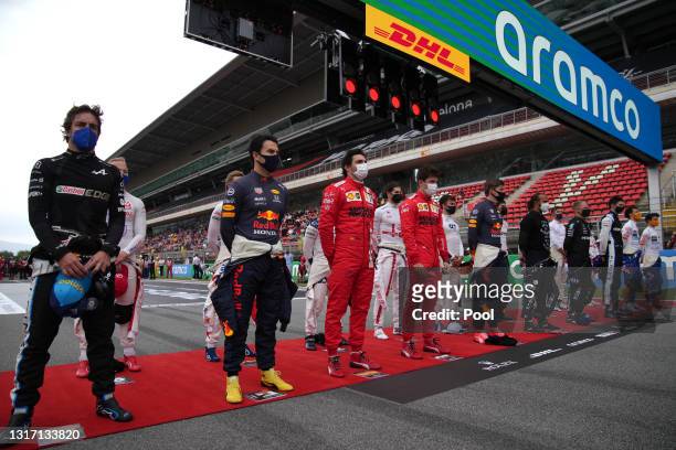 The F1 drivers stand on the grid prior to the F1 Grand Prix of Spain at Circuit de Barcelona-Catalunya on May 09, 2021 in Barcelona, Spain.