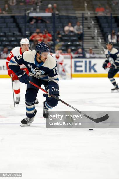 Michael Del Zotto of the Columbus Blue Jackets controls the puck during the game against the Detroit Red Wings at Nationwide Arena on May 7, 2021 in...