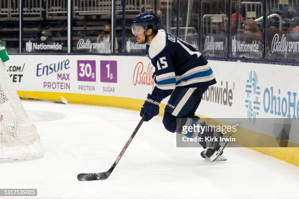 Michael Del Zotto of the Columbus Blue Jackets controls the puck during the game against the Detroit Red Wings at Nationwide Arena on May 7, 2021 in...